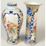 An Chinese export porcelain baluster vase, decorated with figures on a path and floral sprays,