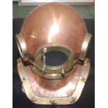 A Russian copper and brass 12 bolt diver's helmet, the glass plate dated 1988, height 50cm,