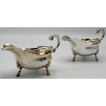 A pair of plain George II silver sauce boats by John Bayley, London 1751, 11oz.