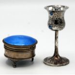 A blue enamelled small silver jewel box on three ball and claw feet,