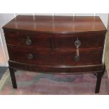 A mahogany veneered bow front chest on stand, width 104cm.