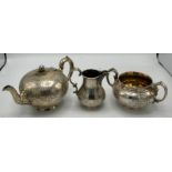 A good Victorian Barnard three piece silver tea service, the pot with melon finial,