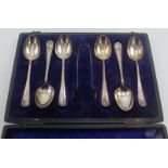 A set of six silver teaspoons and matching sugar tongs, Sheffield 1921, cased.