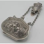 A continental silver purse with silver chatelaine clip.