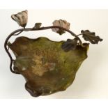 An Art Nouveau bronze serving dish in the form of a large leaf,