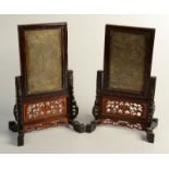 A pair of Chinese carved hardwood table screens,