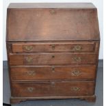 A George III mahogany slope front bureau.