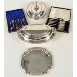 Two entree dishes, a cased set of apostle coffee spoons and two other pieces.
