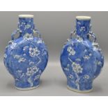 A pair of Chinese blue and white moon vases,