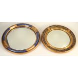 Two circular convex mirrors in gilt and blue painted frames, diameter 35cm and 38.5cm.