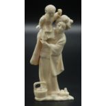 A Japanese Tokyo school ivory okimono, a mother and child,