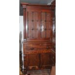 An impressive mahogany secretaire bookcase, the upper section with two doors,