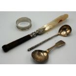A Russian silver lemon tea spoon, the back of the bowl engraved, the stem spiral fluted,