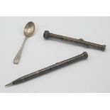 An engraved silver propelled pen and pencil with seal finial and one other propelling silver pencil.