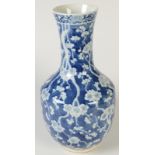 A Chinese blue and white bottle shaped vase with waisted neck and trumpet mouth,