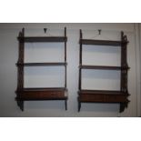 A pair of reproduction Chippendale style hanging shelves, width 52cm, height 95cm.