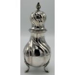 A Copenhagen rococo silver sugar caster with leaf finial, height 22cm, weight 8oz.