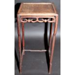 A 19th century Chinese hardwood stand, the square top above a pierced frieze, width 33cm,