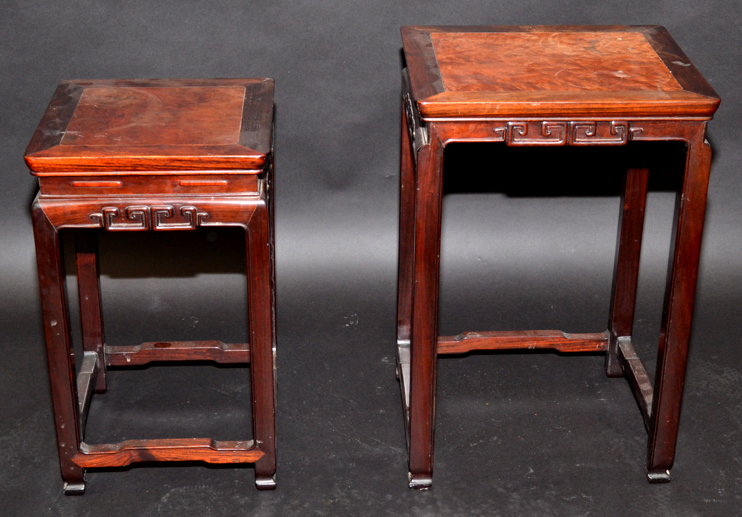 A good Chinese huali wood and burr walnut nest of tables, each with a carved frieze and square