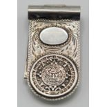 An American silver money clip.