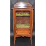 An Edwardian or early George V inlaid small display cabinet.