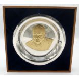 Churchill Centenary Trust, a limited edition gold on silver commemorative plate on an easel stand,