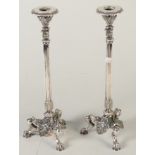 A pair of Elkington tripod candlesticks,
