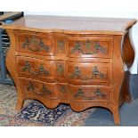 A continental kingwood veneered bombe chest in Louis XV style with ormolu mounts, width 112cm.