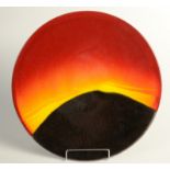 A Poole Pottery 'Eclipse' charger by Alan Clarke,