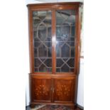 An impressive Georgian style standing corner cabinet,