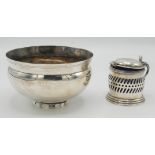 An Edwardian pierced silver drum mustard and a plain Arts and Crafts silver bowl, marks worn, 10oz.