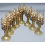 A set of six Bohemian olive-green glass roemers,