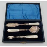 A silver cased and engraved jam spoon,