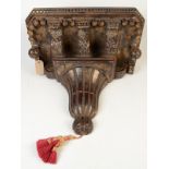 A large 20th century carved wood wall bracket, height 48cm, width 54cm.