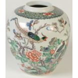 A Chinese ginger jar decorated in famille verte enamels with two exotic phoenix style birds perched