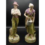 A pair of late 19th century Royal Dux figures,