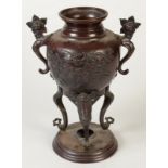 A 19th century Japanese bronze urn,