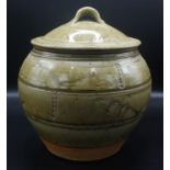 A Phil Rogers large lidded bread crock with transparent green pine ash glaze and incised decoration,