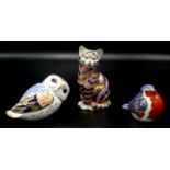 Three Imari Royal Crown Derby models an owl, a cat and a bird.