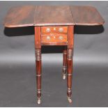 A George IV mahogany small Pembroke table fitted two drawers, on turned legs.