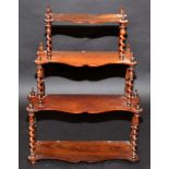 A Victorian rosewood, small three tier whatnot with shaped shelves and spiral turned supports,