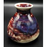 A Ruskin squat shape vase with red and purple mottled glaze, impressed mark Ruskin England 1927,