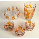 An amber flash, cut glass vase and a similar seven piece fruit set.