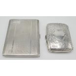 An engine turned, silver cigarette case and a leaf engraved silver cigarette case, 7oz.