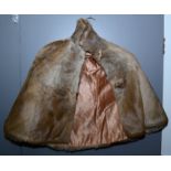 A 1930s possibly red fox fur cape.