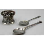 An Irish silver miniature potato ring by West, a prize spoon by Asprey and one other silver spoon.