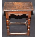 A 17th century oak joint stool.