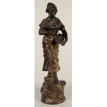 An Edwardian spelter model of a fisher-woman, height 52.5cm.