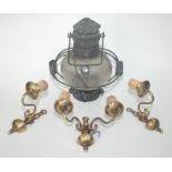 A ship's brass companionway lamp with its original glass shade and paraffin burner,