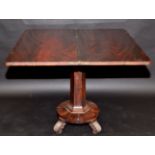 A George IV rosewood, fold top tea table with a camphor carved frieze on hexagonal pedestal,